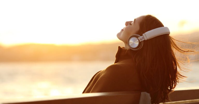 Binaural Pulses a woman with headset listening